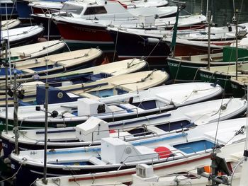 High angle view of boats moored at harbor