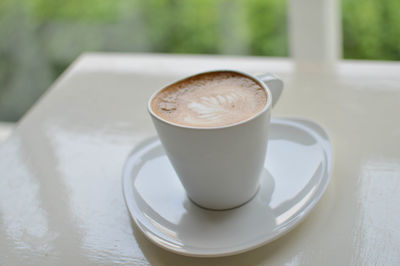 High angle view of coffee on table at home