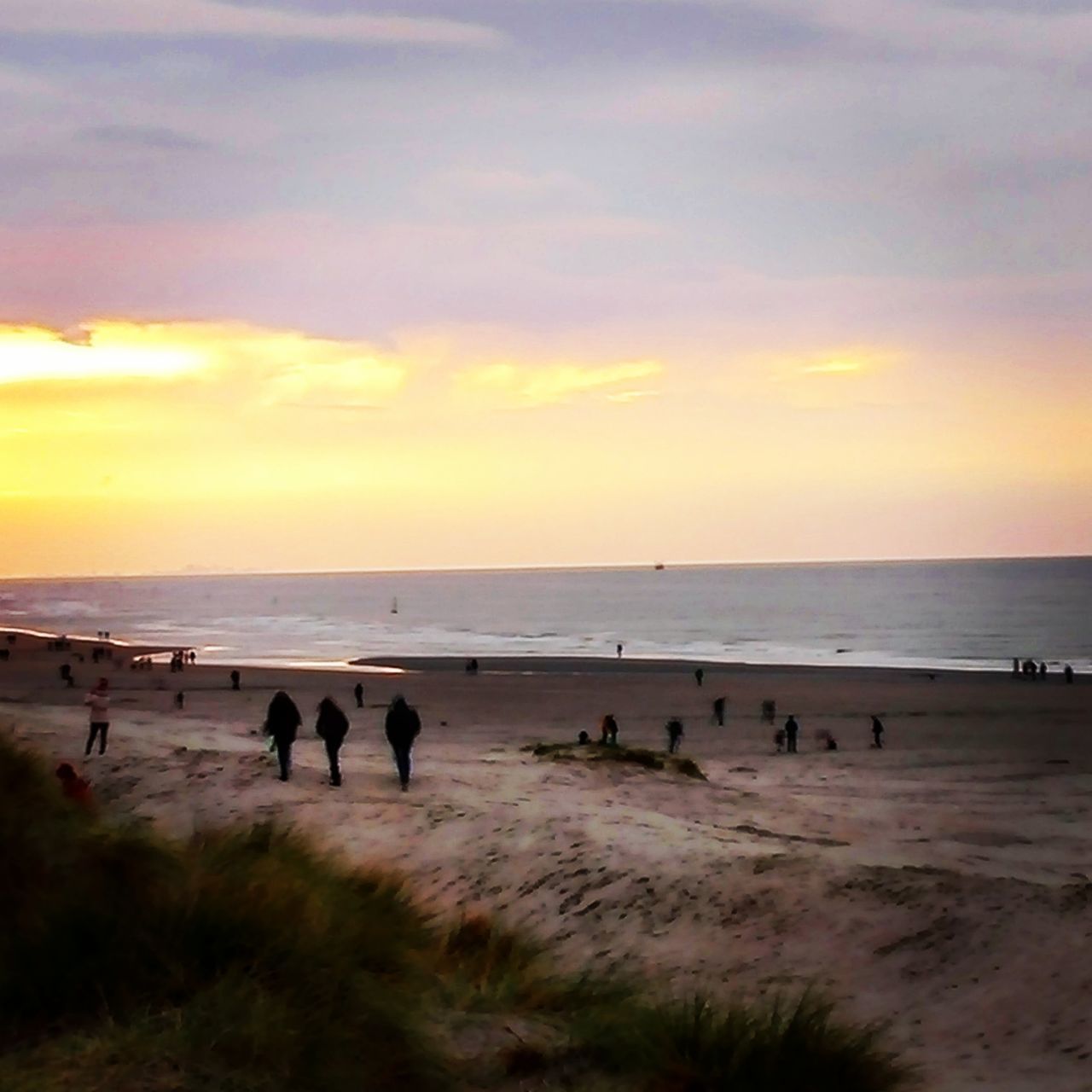 GROUP OF PEOPLE ON BEACH