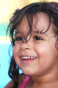 Close-up portrait of a smiling toddler