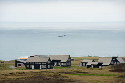 Isolated icelandic village, farm on the coast of atlantic ocean