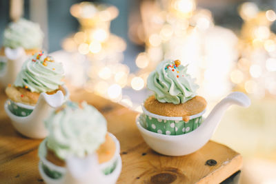 Close-up of cupcakes on table