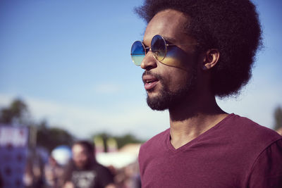 Man wearing sunglasses against sky