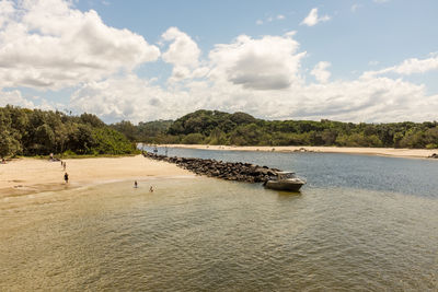 Scenic view of beach against sky