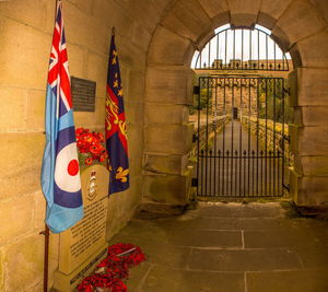 Flags hanging outside building