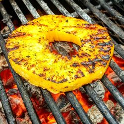 Close-up of yellow leaf on barbecue grill
