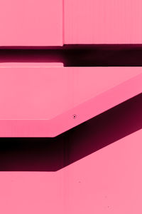 Low angle view of pink wall