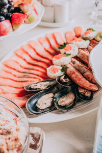 High angle view of fish in plate on table