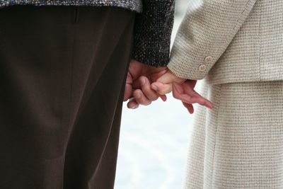 Cropped image of woman holding hands