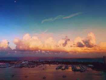 View of beach against cloudy sky