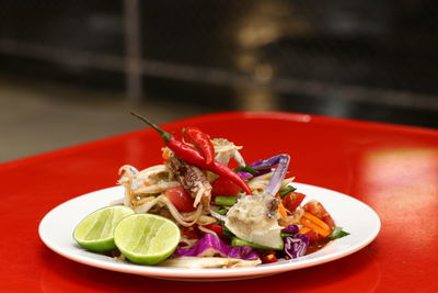 Close-up of salad served in plate on table