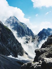 Scenic view of snowcapped mountains against sky