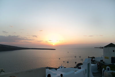 Scenic view of sea against clear sky during sunset