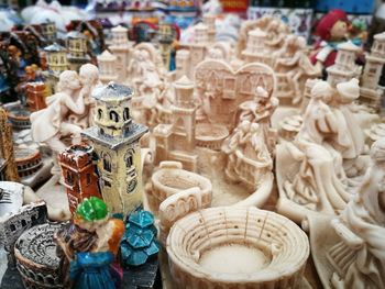 High angle view of statues at market stall