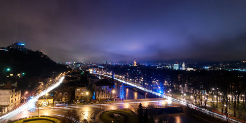 High angle view of illuminated suspension bridge at night