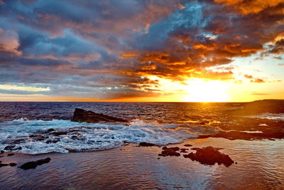 Scenic view of sea against sky during sunset