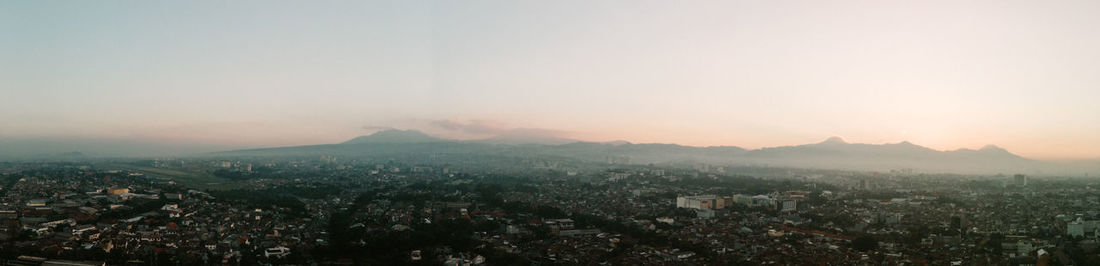 High angle view of townscape against sky during sunset