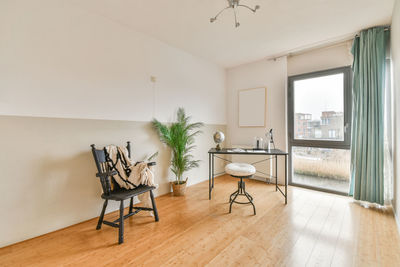 High angle view of empty chairs at home