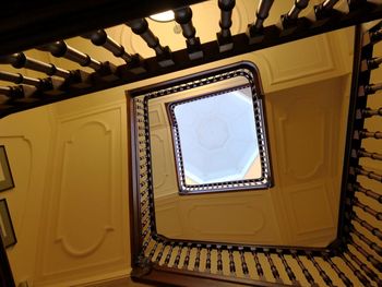 Low angle view of spiral staircase in building