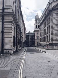 Street in city against sky