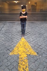 Woman standing on street