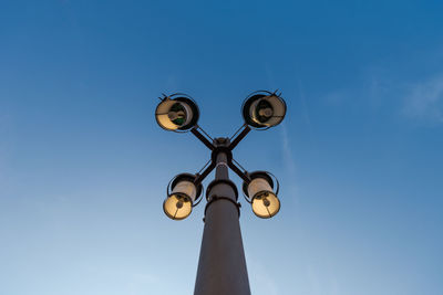 Low angle view of street light against sky