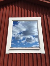 Low angle view of window against sky