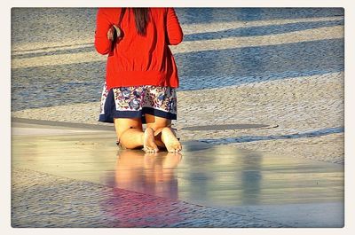 Reflection of woman in water