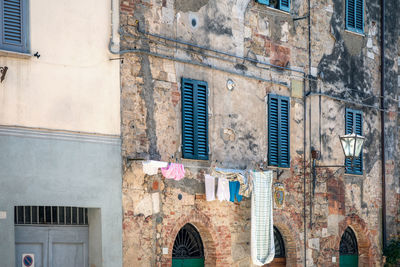 Siena province, tuscany  - details of old building architecture in asciano town