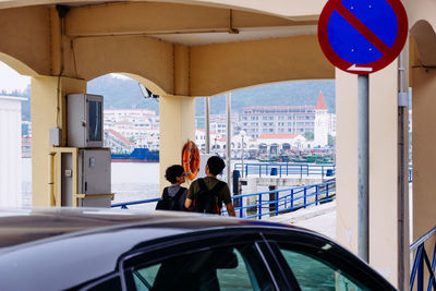 Rear view of people traveling in bus