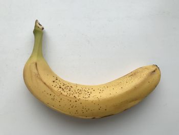 High angle view of bananas on white table