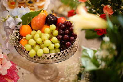 High angle view of grapes in container