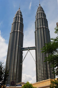 Low angle view of modern buildings against sky