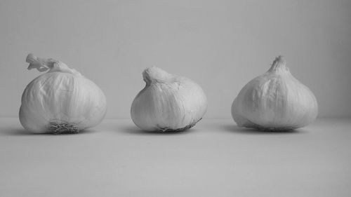 Close-up of candies against white background