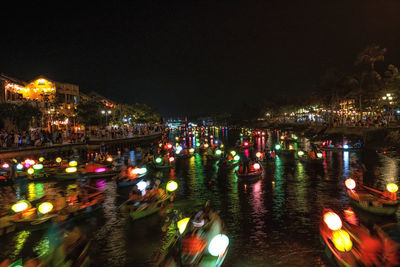 Lantern boat ride in hoi an on the thu bon river at night. taken in hoi an, vietnam