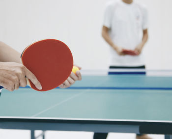 People playing table tennis