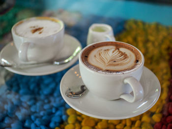 Close-up of coffee cup on table