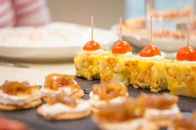 Close-up of serving food on table