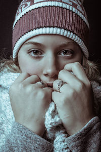 Close-up portrait of woman in winter