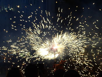 Firework display at night