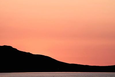 Silhouette of mountain at sunset
