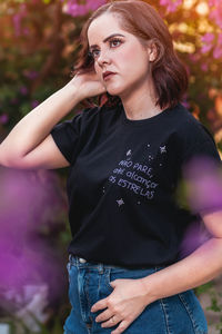 Portrait of young woman looking away