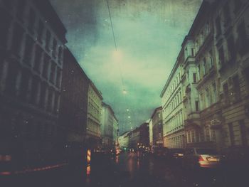 Buildings in city at night