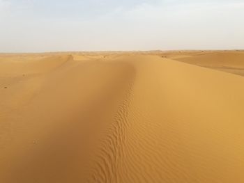 Scenic view of desert against sky