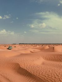 Scenic view of desert against sky