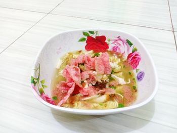 High angle view of salad in bowl on table