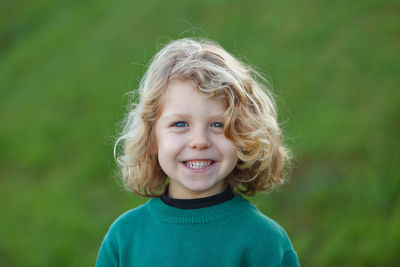 Portrait of cute smiling girl outdoors