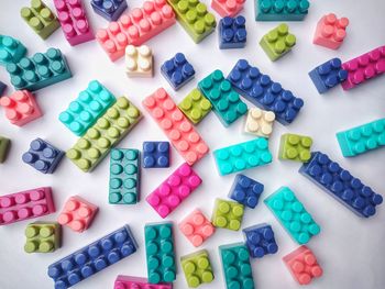 High angle view of multi colored toys on table