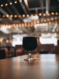 Close-up of wineglass on table in restaurant