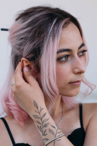 Close-up portrait of young woman